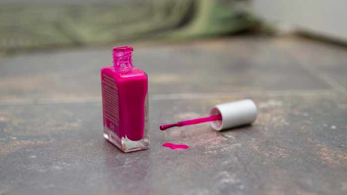 get rid of spilled nail polish on marble floor