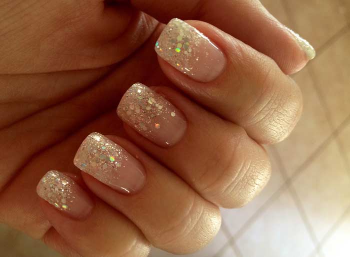 French manicure with gold glitter design