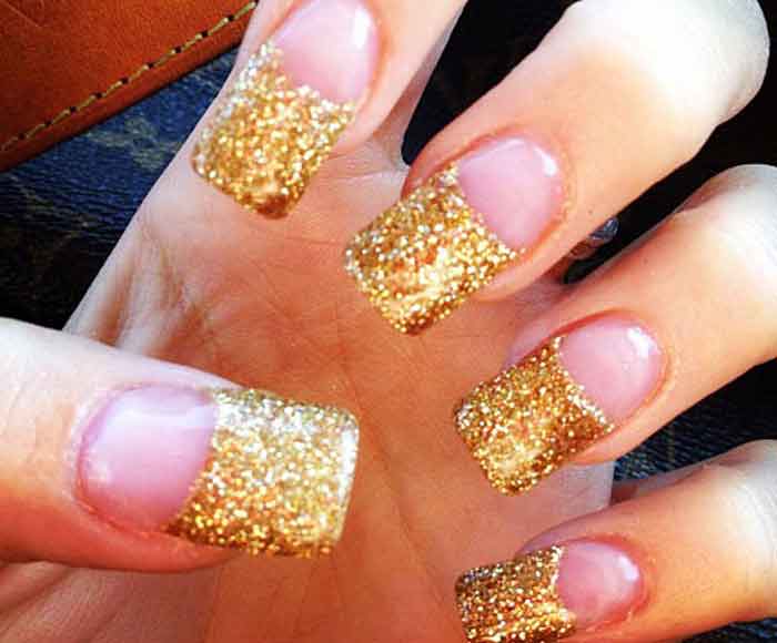 french manicure with gold glitter